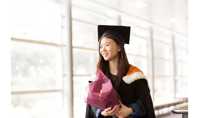 Study Generic Graduate With Flowers