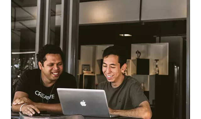 Business Young Mentor With Laptop