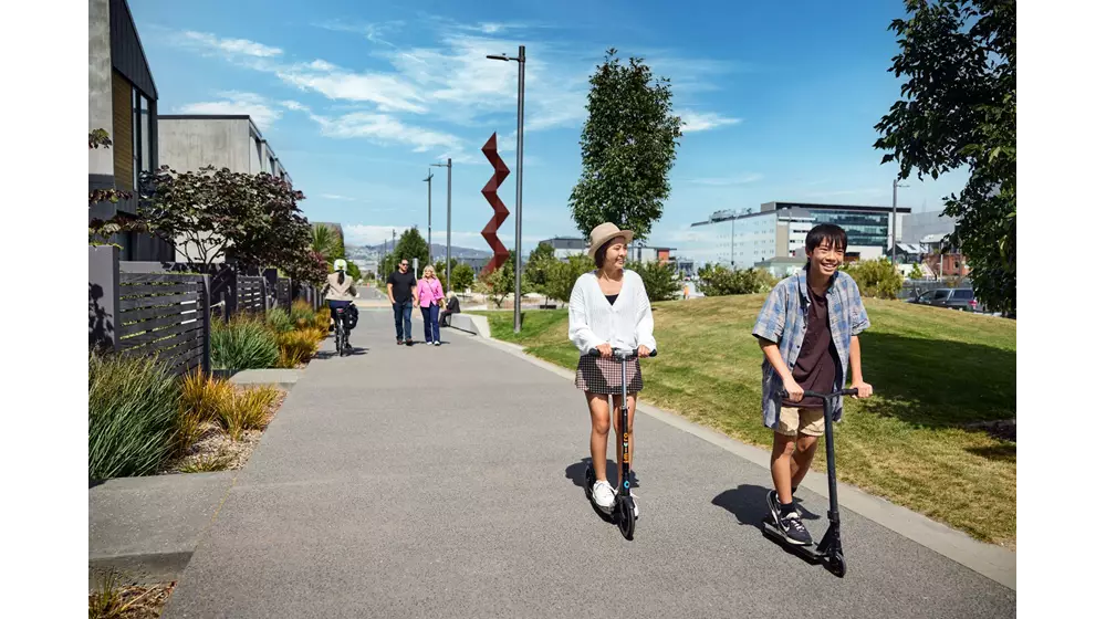 Teenagers On Scooters In Eastern Frame