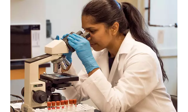 Business Female Scientist Testing Results Credit Trust Tru Katsande